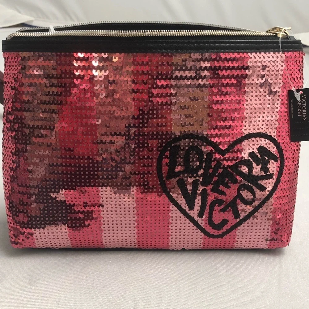 Victoria’s Secret pink and black sequin cosmetic or toiletries bag
